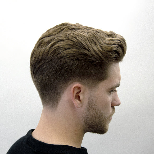Man with short wavy hair